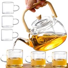 a person pouring tea into four glasses