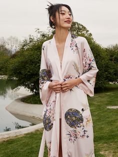 Wrap yourself in the luxurious feel of our ultra-soft, high-quality fabric, adorned with hand-painted floral prints. Designed to care for your skin morning and night, our robe kisses away wrinkles, ensuring joy for every occasion. Experience unmatched comfort and elegance, making each moment a celebration of beauty. • Silky Comfort: Made of high-quality polyester charmeuse, our robes are soft, lightweight and cooling for summer. They have a smooth and breathable texture that feels just like natu Satin Kimono, Floral Kimono, Bridal Robes, Vintage Kimono, Womens Robes, Silk Kimono, Natural Silk, Wide Sleeves, Mulberry Silk