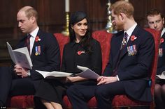 prince harry and the duke of cambridge sitting next to each other