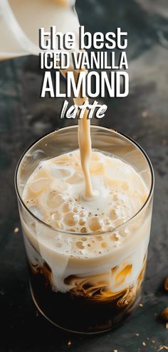 the best iced vanilla almond latte in a glass on a table with text overlay