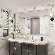 a bathroom with marble counter tops and mirrors