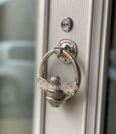 a door handle with an owl on it