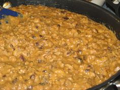 a pot filled with lots of food on top of a stove