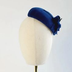 Royal Blue Autumn Wedding Hat worn to the left of the head