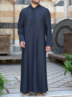 Full length Hood with drawstring ties Buttoned neck opening Side slit pockets Model is 184cm (6 feet) and wearing size L Item Code: mG6103 Thobes Men, Light Peach, Extra Fabric, Comfortable Dress, Different Fabrics, Body Size, Black Media, Full Length, Lifestyle