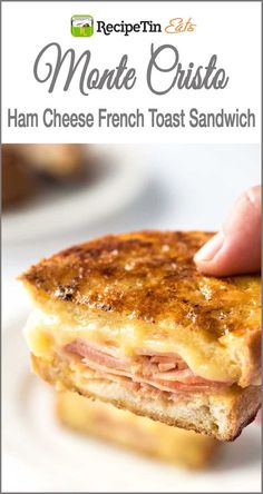 ham cheese french toast sandwich on a white plate with text overlay that reads, monte cristoe ham cheese toast sandwich