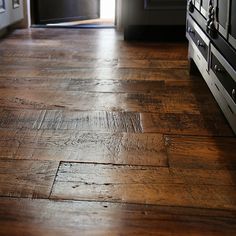 an old wood floor in a kitchen