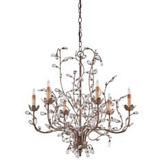 a chandelier with many lights hanging from it's center branch and leaves