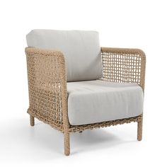 a wicker chair with grey cushions on an isolated white background