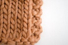 a close up of a knitted piece of cloth