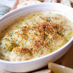 a close up of a bowl of food on a table