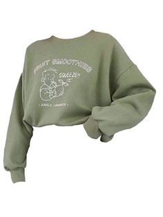 a women's cropped sweatshirt with an image of winnie the pooh on it