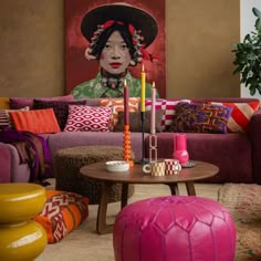 a living room filled with lots of colorful furniture