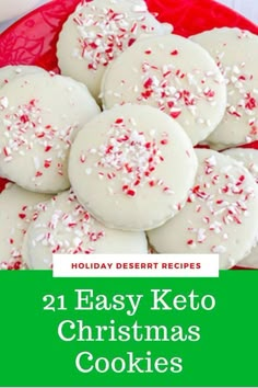 easy keto christmas cookies with white frosting and sprinkles on a red plate