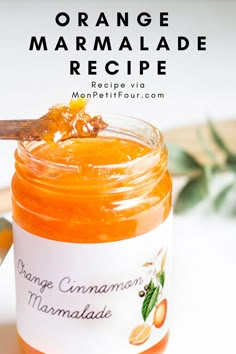 an orange marmalade recipe in a jar with a spoon on the side and text overlay that reads orange marmalade recipe