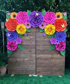 a wooden box with colorful flowers on it