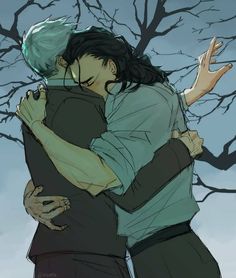 two people hugging each other in front of trees