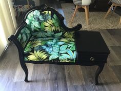 a chair that is sitting on top of a wooden floor in front of a window