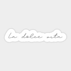 the word la dolce vita written in cursive writing on a white background