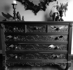 black and white photograph of an ornate dresser