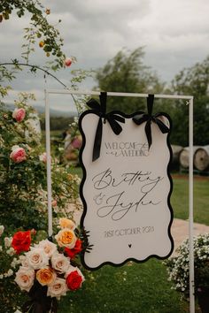 a sign that says welcome to the bride and groom