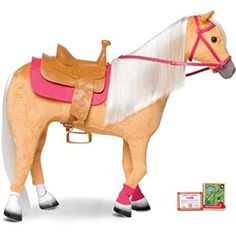 a toy horse with white hair and pink saddle