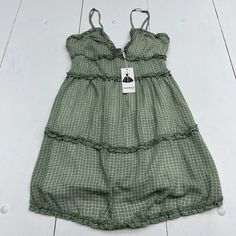 Angashion Green Ruffle Square Print Sleeveless Dress Women’s Size Medium. Condition Is New With Tags See Pics Ls322/22 J3 Lh27 Summer Cami Dress With Ruffles, Summer Cami Mini Dress With Ruffles, Spring Cami Mini Dress With Ruffles, Cami Mini Dress With Ruffles For Summer, Casual Sleeveless Dress With Ruffle Hem For Spring, Green Ruffled Straps Sundress For Summer, Green Sundress With Ruffled Straps For Summer, Summer Ruffled Cami Dress, Chic Cami Mini Dress With Ruffles