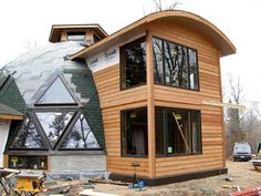 the house is being built and ready to be installed on top of the other building