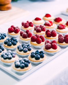 there are many desserts on the table ready to be eaten at this party or celebration