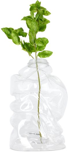 Hand-formed sculptural upcycled plastic vase. · Designed by Olivier Sundqvist & Frederik Nystrup-Larsen · Logo printed at base · Hand wash · H14.5 x D9 Each item in unique. Please note that coloration and finishing may vary. Supplier color: Clear Niko June, Classic Vase, Plastic Vase, Vase Design, Side Hustle, Vases Decor, Garden Decor, How To Find Out, Hand Wash