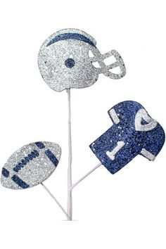 glitter football and helmet cake toppers on a stick