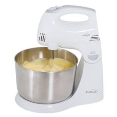 an electric mixer with a bowl on it