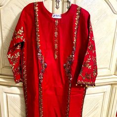 2 Pieces Dress With Sequences Embriodery Red Floral Embroidered Kurta For Eid, Red Floral Embroidery Kurta For Eid, Red Embellished Kurta For Festive Occasions, Red Embellished Festive Kurta, Festive Red Embellished Kurta, Red Embellished Kurta For Festivals, Red Kurta For Spring, Red Kurta With Resham Embroidery For Celebration, Red Sets With Zari Work For Spring