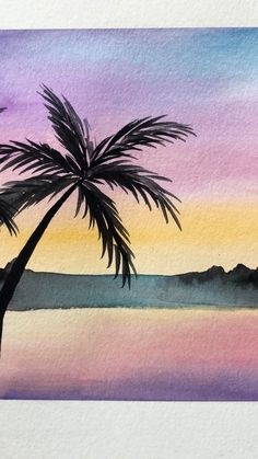 a watercolor painting of a palm tree in the sunset