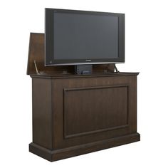 a flat screen tv sitting on top of a wooden cabinet