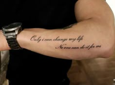 a person with a wrist tattoo that says, only can change my life you can do it for me