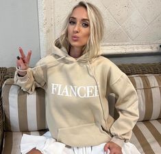 Personalized Fiancee Hoodie - Customized Engagement Gift,Bridal shower Gift Idea, Engagement, FIANCE Sweatshirt, Fiancee Era Sweatshirt  Show your love and appreciation for your fiancee with this cozy and stylish Fiancee Hoodie. This soft and comfortable hoodie is the perfect gift to spoil your special someone and show them how much they mean to you. Whether you're cuddling up at home or out for a casual day together, this hoodie is sure to keep them warm and feeling loved. Make every moment tog Engagement Shoot Sweater, Special Gifts For Fiance, Unique Gifts For Fiance, Fiance Sweatshirt, Custom Engagement Gifts, Hoodie Customize, Bridal Shower Gift, Feeling Loved, Bridal Shower Gifts