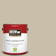 a white paint can with the words behr premium plus ultra on it's side