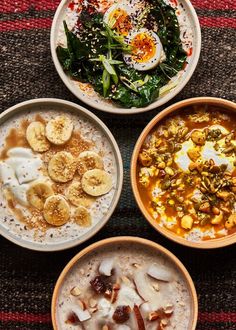 four bowls filled with food on top of a pink tablecloth next to each other