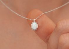 "Handmade Necklace 14k Solid Gold Opal Necklace, White Gold Opal Necklace, Oval Opal Necklace, 14k Gold White Opal Necklace, Gift for Mom, Mothers Day Gift * Material: 14k solid gold * Finished Color: white gold, rose gold, yellow gold H O W ∙ T O ∙ O R D E R - Select options from the drop-down menu - Add to cart and proceed to checkout GEMSTONE DETAILS Stone: White Opal Size:9x6 mm Shape: Oval Carnelian is the best-known and generally least expensive variety of chalcedony. *Carnelian is an exce Opal Necklace Aesthetic, Opal Silver Jewelry, White Opal Necklace, White Opal Jewelry, Dainty Oval Necklace Ideal For Gifts, Dainty Oval Necklace For Gift, Delicate Oval White Gold Necklaces, Dainty Oval Necklace For Anniversary, White Oval Link Necklace For Anniversary