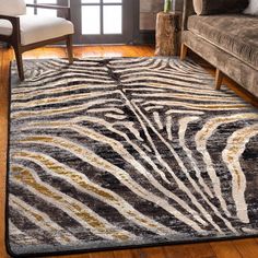 Made in the USA. Woven from premium EnduraStran nylon for easy care and durability. Synthetic Loc-Bak backing ensures this rug lays flat and won’t curl. Use of a rug pad is recommended to prevent slippage and movement. 4-ft x 5-ft size is a perfect accent piece for foyers and next to beds. Heat resistant fiber is safe to use in any area of your home. Spot cleans easily with mild detergent/ vacuum regularly to keep it looking like new. Moisture-wicking nylon material resists pet dander and bacter Golden Zebra, Zebra Print Rug, Zebra Rug, Decor Western, Luxury Floor, Zebra Design, Area Rug Runners, Custom Made Furniture, Gold Print