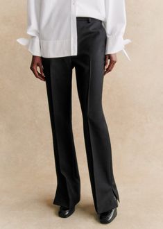 Long trousers with dropped waist;Italian pockets at front and piping at back;Broken pleats front and back;Side slits at bottom of leg;Hidden clip and zip fastening;Inside leg length: 82 cm / 32.3 in (for a 36) Statement Skirt, Trousers Jeans, Long Trousers, Straight Leg Trousers, Trouser Jeans, Parisian Style, Elegant Dress, Chambray, Occasion Wear