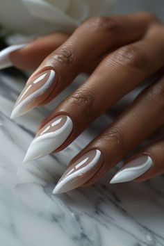 Are you in search of some attractive white nail designs to experiment with during this season? If yes, then you have landed on the right article! As summer is approaching, I have curated a list of my preferred styles to offer you some ideas. I have included various designs ranging from abstract to indie to cater to different preferences.Many of these styles can be easily replicated in the comfort of your own home! If you’re interested in trying a matte style Almond Nails Galaxy, Fall White Nail Designs, Cool French Manicure Ideas, Sheer Nail Ideas, Extensive Nail Art, Wedding Nails 2024 Trends, White And Blue Wedding Nails, French Tip With Glitter Base, French Nail Designs White