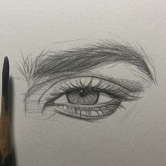 a pencil drawing of an eye with long lashes