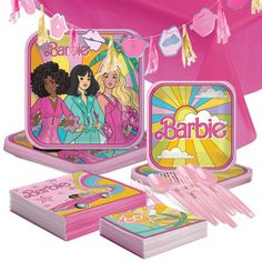 barbie birthday party supplies including plates, napkins and utensils