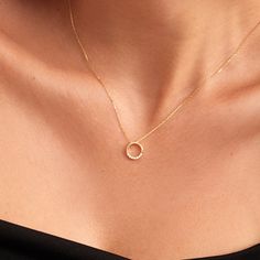 "This circle pendant necklace is your go-to piece of every day, any day. With diamond drops on the bottom side, you'll shine any time you want. Choose your special day or just a random Friday to gift yourself or your loved ones. F E A T U R E S * Made to Order. * Gold KT: 14K * Choice of Gold Color: Yellow Gold, Rose Gold, White Gold * Gem Stone: Genuine Diamond * Diamond-Cut: Round * Diamond Carat: 0.02 ct * Pendant Height: 10 mm / 0.39 inch * Pendant Width: 10 mm / 0.39 inch * Diamond Color-Cl Collaring Ceremony, Diamond Circle Necklace, Minimal Pendant, Open Circle Necklace, Alphabet Worksheets Kindergarten, Gold Pendent, Diamond Pendants Designs, Karma Necklace, Simple Diamonds