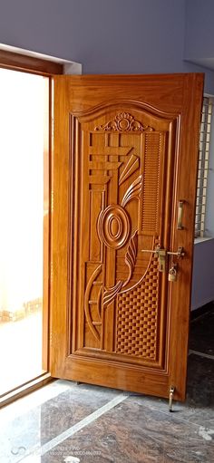 an open wooden door with music notes carved on the front and side panels inlays