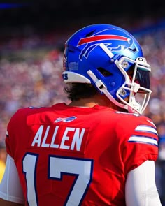 a close up of a football player wearing a helmet