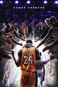 the basketball player is surrounded by his team mates in front of an arena full of fans