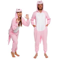 two people dressed in pink and white onesuits